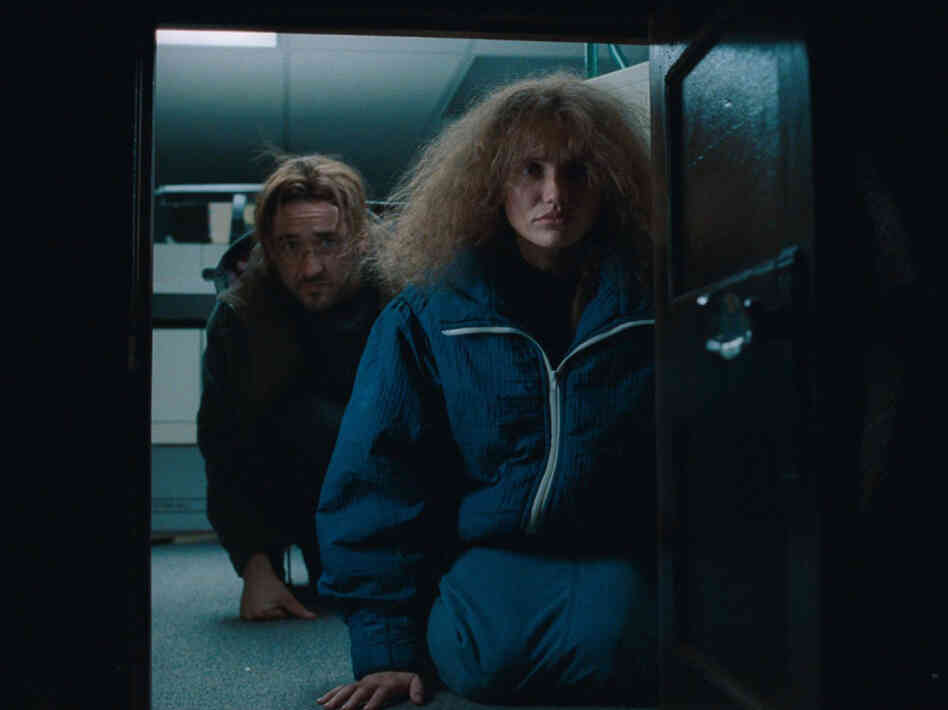 John Cusack and Cameron Diaz in Being John Malkovich. John Cusack and Cameron Diaz in Being John Malkovich.