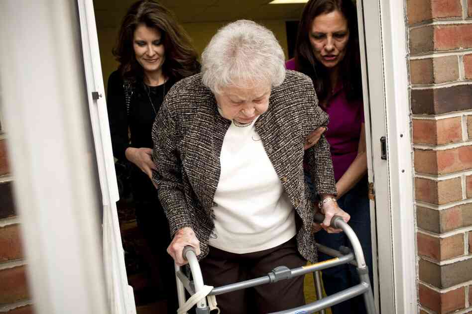 Kelley (left) and her sister-in-law LaDonna Martin jointly care for Kelley's grandmother AnnaBelle Bowers, who is no longer able to live independently.