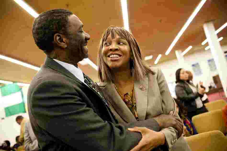Natasha embraces her husband, Curtis, after Sunday worship at The Sanctuary Baptist church. "I love Curtis," Nicholas says. "He keeps a roof over our heads and keeps us laughing."