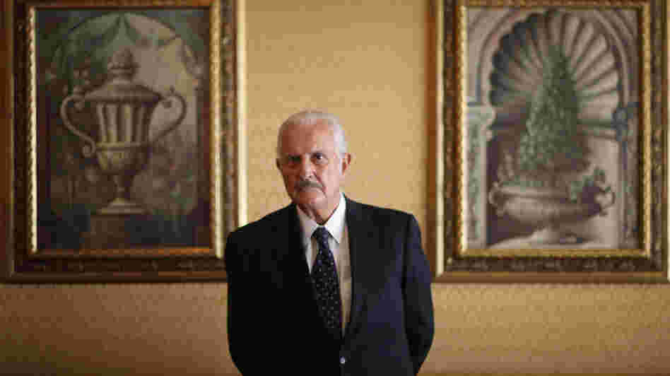 Mexican author Carlos Fuentes poses for a photo after a news conference in Mexico City on March 12. Fuentes died Tuesday at a hospital in Mexico City. He was 83. Mexican author Carlos Fuentes poses for a photo after a news conference in Mexico City on March 12. Fuentes died Tuesday at a hospital in Mexico City. He was 83.