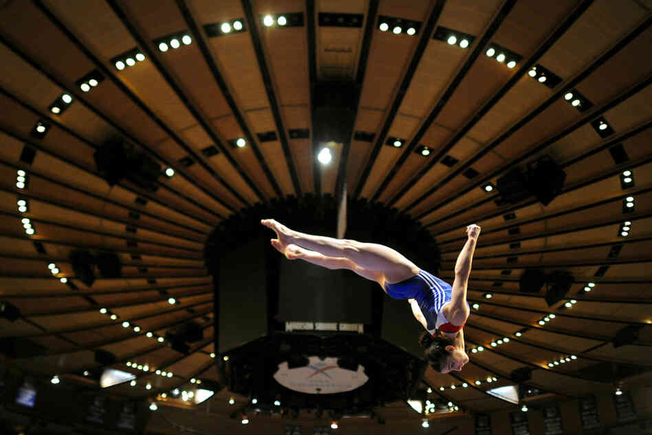 Aly Raisman practices on the balance beam at the 2012 American Cup at Madison Square Garden in New York. She placed second in the all-around portion of the event. Aly Raisman practices on the balance beam at the 2012 American Cup at Madison Square Garden in New York. She placed second in the all-around portion of the event.