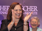 Nebraska state Sen. Deb Fischer applauds supporters at her election party Tuesday in Lincoln, Neb. At right is Fischer's mother, Florence Strobel. Nebraska state Sen. Deb Fischer applauds supporters at her election party Tuesday in Lincoln, Neb. At right is Fischer's mother, Florence Strobel.
