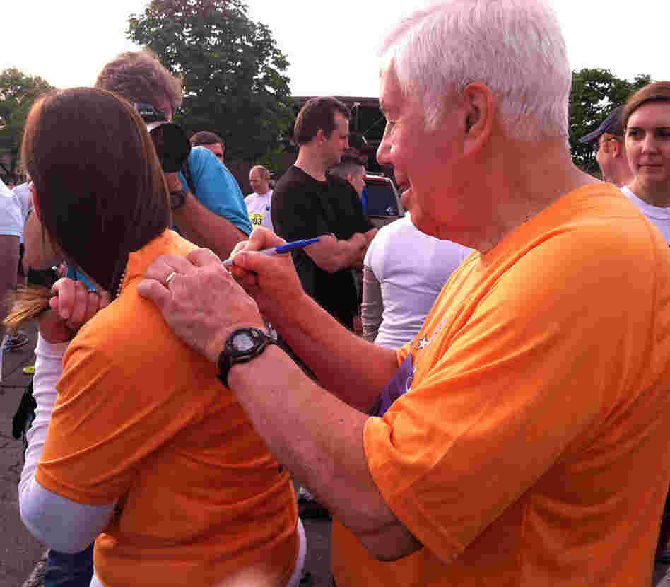 Sen. Lugar signs an autograph at the Capital Challenge race. Sen. Lugar signs an autograph at the Capital Challenge race.