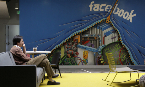 A worker sits in the Facebook office in Menlo Park, Calif. The amount of information Facebook learns about its users seems to have entranced Wall Street. A worker sits in the Facebook office in Menlo Park, Calif. The amount of information Facebook learns about its users seems to have entranced Wall Street.