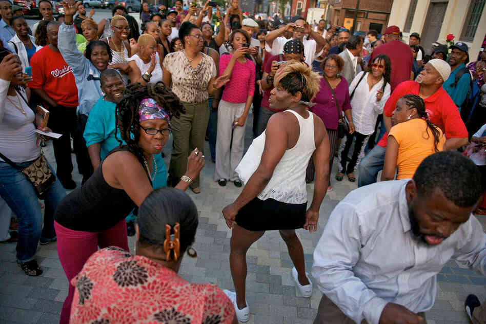 On Wednesday night, fans gathered to celebrate Brown's life outside the Howard Theatre in Washington, D.C. 