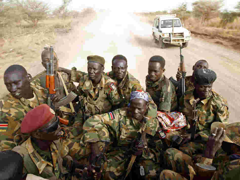 South Sudanese soldiers travel near the front line with Sudan last month. The two sides have clashed repeatedly in recent weeks.