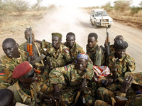 South Sudanese soldiers travel near the front line with Sudan last month. The two sides have clashed repeatedly in recent weeks.