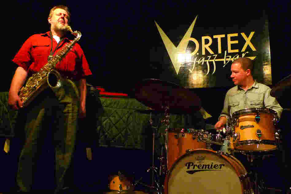 Saxophonist Paul Dunmall and drummer Mark Sanders perform (with guitarist Hasse Poulsen, off camera) at The Vortex in London.