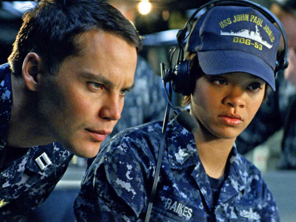 Hopper and Raikes attempt to decipher a strange reading that precedes the alien attack.