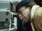 American film director and photographer Gordon Parks on the set of a film, circa 1971. American film director and photographer Gordon Parks on the set of a film, circa 1971.