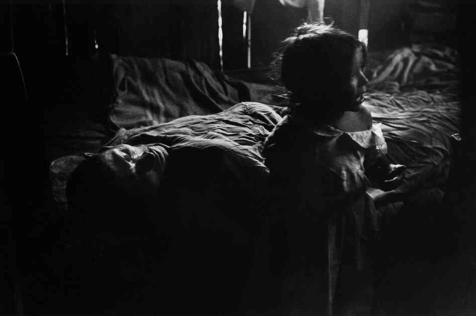 Isabel Beside Sick Father, Rio de Janeiro, Brazil, 1961