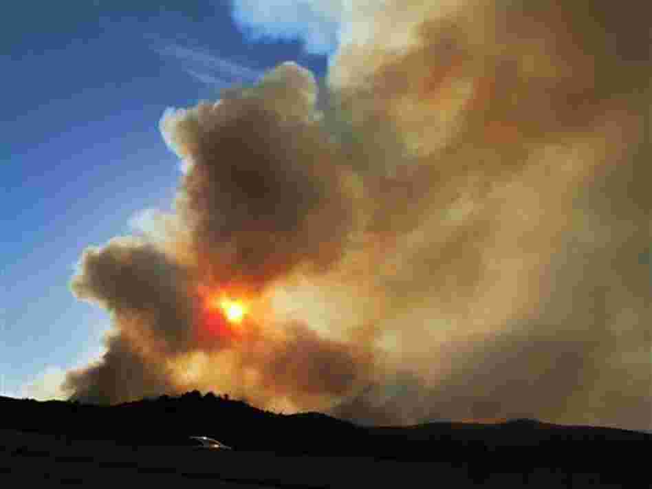 A fire blazes in Arizona's Tonto National Forest, near Payson, Ariz., on May 12, 2012. A fire blazes in Arizona's Tonto National Forest, near Payson, Ariz., on May 12, 2012.