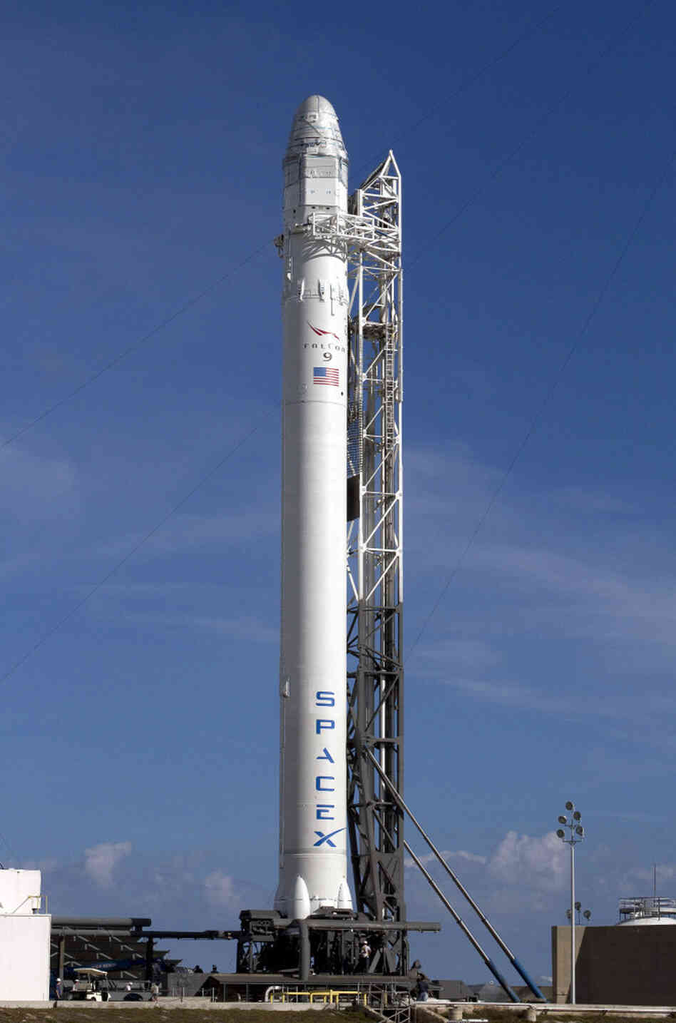 A SpaceX rocket waits to be launched at Cape Canaveral, Fla., in March. If all goes as planned, the private company's rocket will be the first commercial spacecraft to visit the International Space Station. A SpaceX rocket waits to be launched at Cape Canaveral, Fla., in March. If all goes as planned, the private company's rocket will be the first commercial spacecraft to visit the International Space Station.