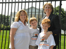 Family Equality Council Executive Director Jennifer Chrisler (left), her partner Cheryl Jacques and their sons Tom and Tim Jacques visited Washington on Thursday to ask Congress for equal rights for same-sex families. Family Equality Council Executive Director Jennifer Chrisler (left), her partner Cheryl Jacques and their sons Tom and Tim Jacques visited Washington on Thursday to ask Congress for equal rights for same-sex families.