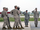 A Marine Corps team carries the remains of Marine Sgt. J.P. Huling, 25, of West Chester, Ohio, at Dover Air Force Base, Del., on May 9. Huling was killed three days earlier by an Afghan soldier in southern Afghanistan, one of a growing number of such shootings. A Marine Corps team carries the remains of Marine Sgt. J.P. Huling, 25, of West Chester, Ohio, at Dover Air Force Base, Del., on May 9. Huling was killed three days earlier by an Afghan soldier in southern Afghanistan, one of a growing number of such shootings.