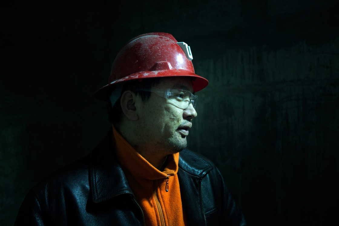 Tseren-ochir is a superintendent at Oyu Tolgoi mine who goes by the name "Augie" because it's easier for the foreigners he works with to pronounce. He is overseeing workers digging a nearly 5,000-foot-deep shaft down to reach the copper ore.