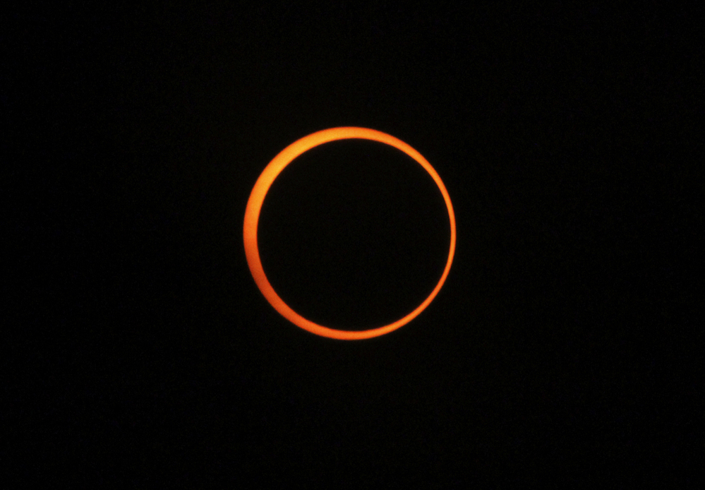 An annular solar eclipse is seen over Myanmar on Jan. 15, 2010 as the moon crossed the sun's path, blocking everything but a narrow, blazing rim of light.
