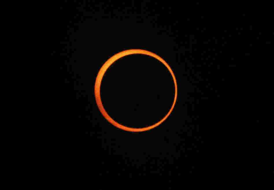 An annular solar eclipse is seen over Myanmar on Jan. 15, 2010 as the moon crossed the sun's path, blocking everything but a narrow, blazing rim of light.