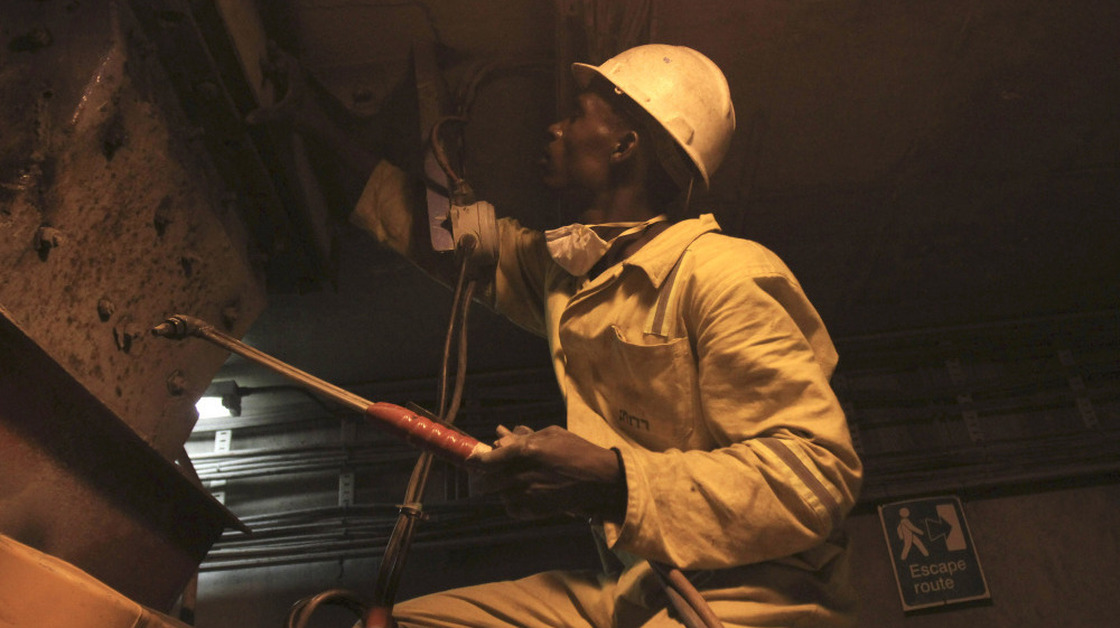 A miner works in the Mimosa Platinum mine in February. A strong mining industry has helped Zimbabwe recover from disastrous economic conditions a few years ago.