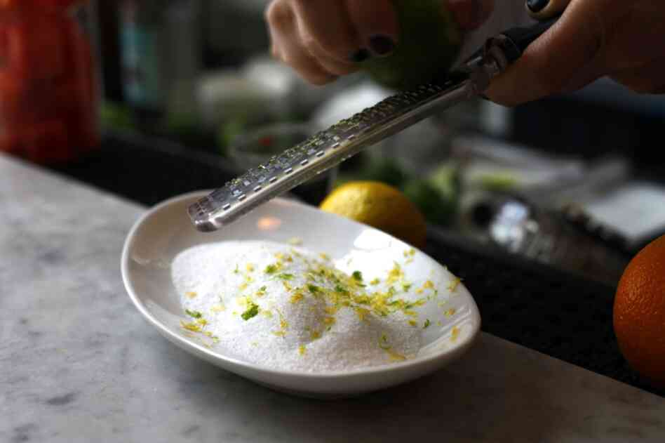 Grate some lime and lemon zest into sea salt.