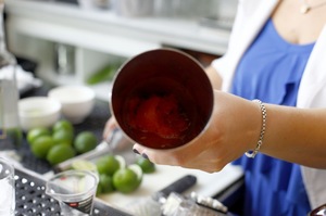 Muddle, or mash down, 4 or 5 cubes of watermelon.
