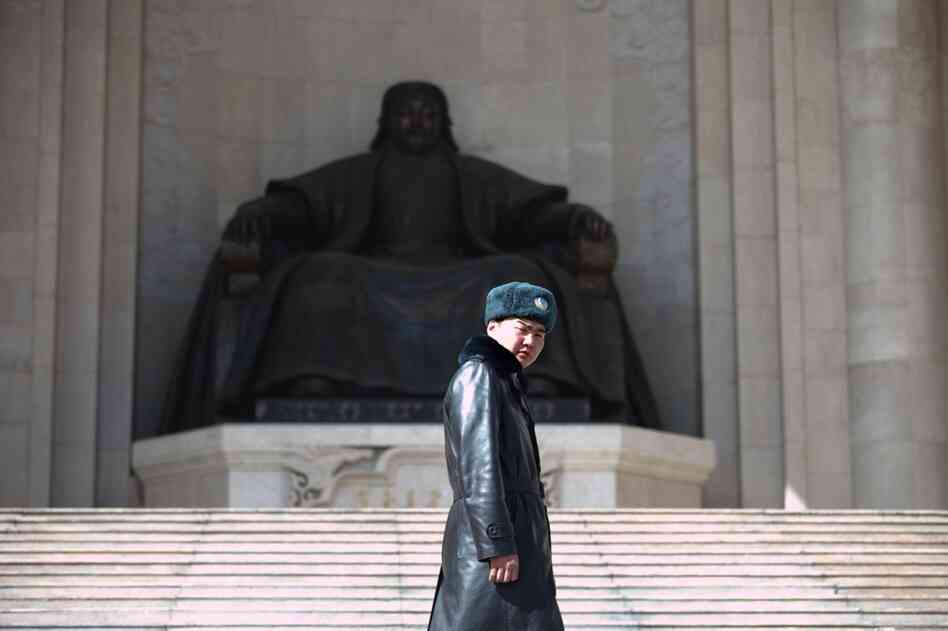 The Central Asian nation of Mongolia is undergoing vast change, thanks to a booming mining industry. A guard in Ulan Bator, the capital, surveys central Sukhbaatar Square; behind him stands a giant statue of Genghis Khan, the country's founder.