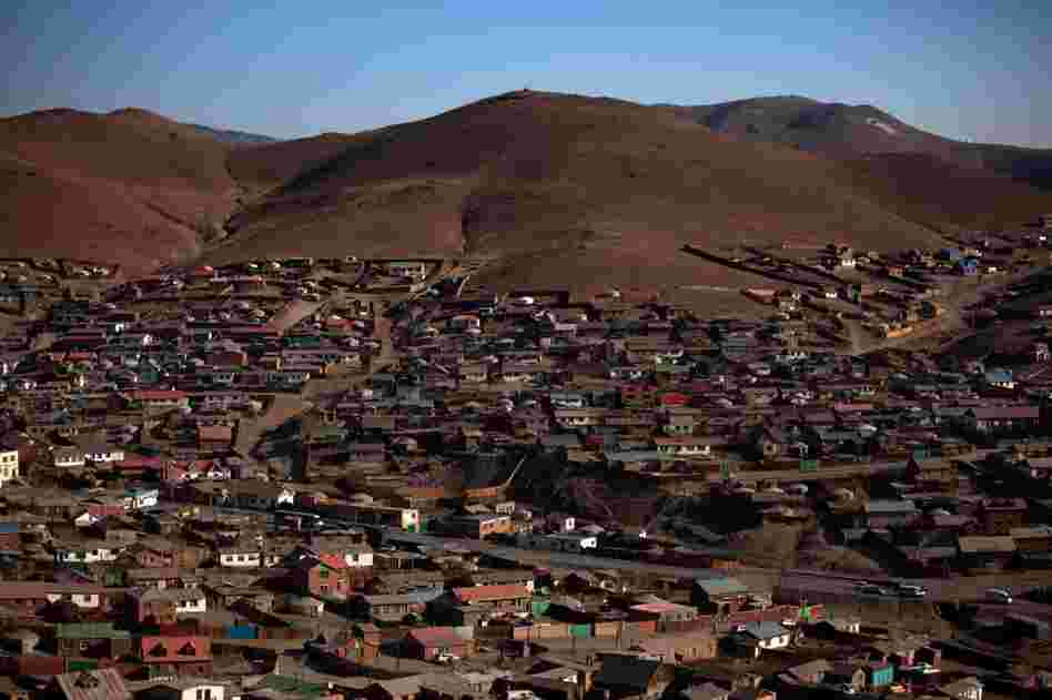 So-called ger villages — actually a mix of yurts and more permanent shelters — spread out onto the hills surrounding Ulan Bator. Some plots are legally purchased; others are occupied by squatters. Most residents have left lives as herders to look for jobs in Mongolia's capital. One-third of Mongolia's population lives in Ulan Bator.