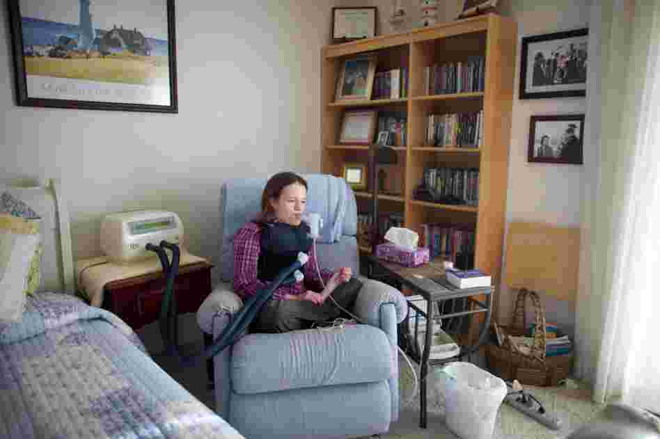 On the wall of her apartment are pictures of Beckett as a child with President Reagan. Reagan created the "Katie Beckett waiver" that changed the Medicaid rules to allow severely disabled children and adults to get government-funded care in their own homes.