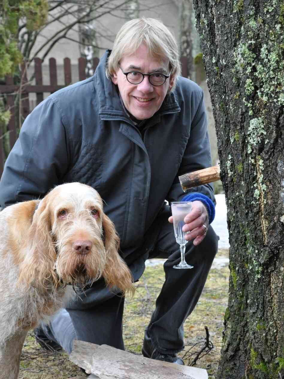 Chef Martin Ritins and his dog, Pablo, tap the sap