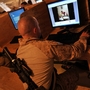 At Forward Operating Base Payne in Afghanistan's Helmand province, Marine Cpl. Jonathan Odriscoll looks at pictures of his sister on Facebook. Troop access to social media has been both a blessing and curse for the military. At Forward Operating Base Payne in Afghanistan's Helmand province, Marine Cpl. Jonathan Odriscoll looks at pictures of his sister on Facebook. Troop access to social media has been both a blessing and curse for the military.