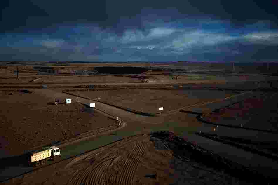 These roads lead to Oyu Tolgoi's mine (visible in the distance). Within five years, the gold and copper mine is expected to be the third-largest in the world.