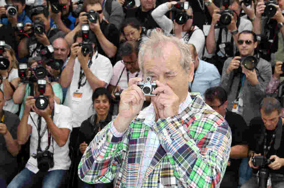 Bill Murray snaps a few at a Cannes press event on May 16. Bill Murray snaps a few at a Cannes press event on May 16.