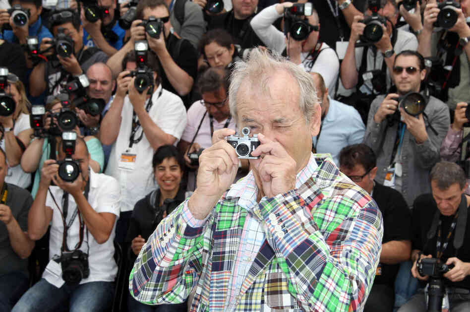 Bill Murray snaps a few at a Cannes press event on May 16. Bill Murray snaps a few at a Cannes press event on May 16.