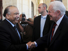 In Cairo on Monday, Egyptian Parliament Speaker Saad al-Katatni (left) met with former U.S. President Jimmy Carter. In Cairo on Monday, Egyptian Parliament Speaker Saad al-Katatni (left) met with former U.S. President Jimmy Carter.