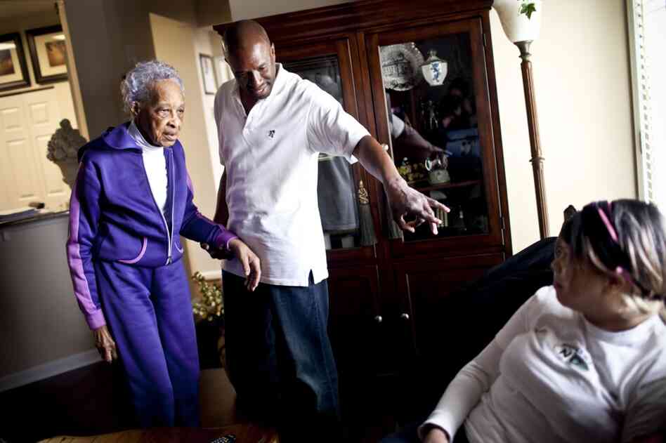 Frank Christian asks his mother, Ida, if she recognizes his daughter, Shannon. Ida lived with Frank's family in Virginia from 2001 to 2009. After being diagnosed with dementia, Ida moved in with Frank's sister Geneva, who lives in Maryland.