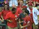 Caleb Lloyd, with the ball in his left hand, celebrates after catching the first of the back-to-back home runs that came his way Monday night in Cincinnati.
