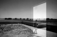 A man is reflected in the window of an Afghan police watchtower. Police will be an important part of the area's security after the Marines leave.
