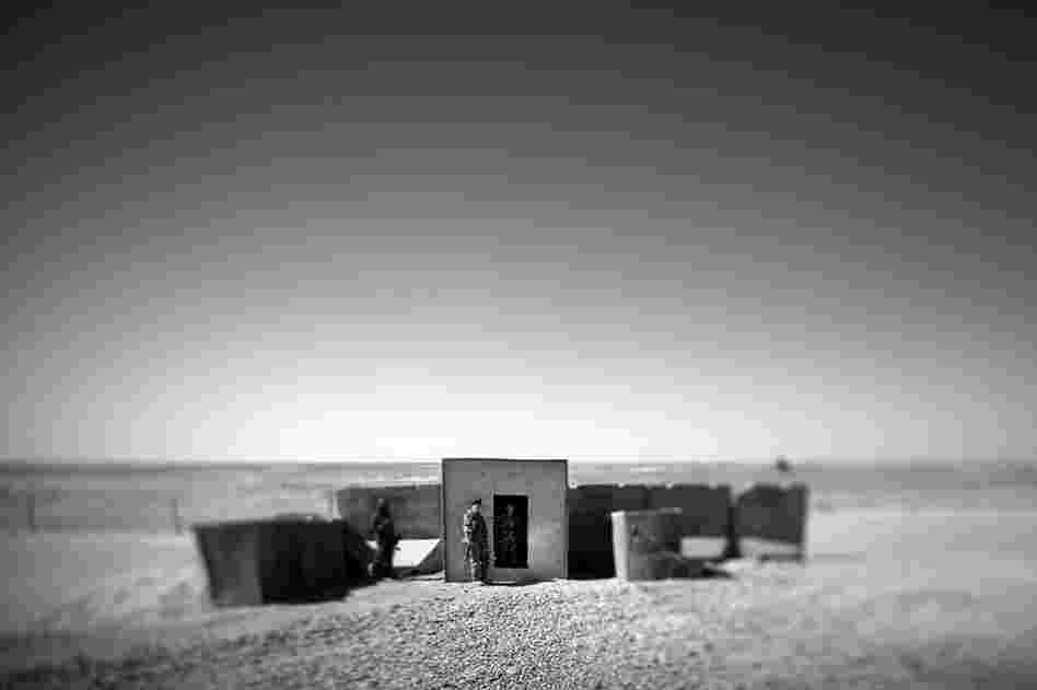 An Afghan army checkpoint sits on the edge of the Sistani Desert. It serves as an entry point to the farm fields of Marjah, in southern Afghanistan.