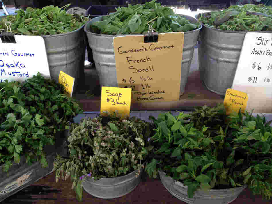 Assorted herbs and greens from Gardeners Gourmet of Westminster, Md., at the Eastern Market in Washington, D.C.