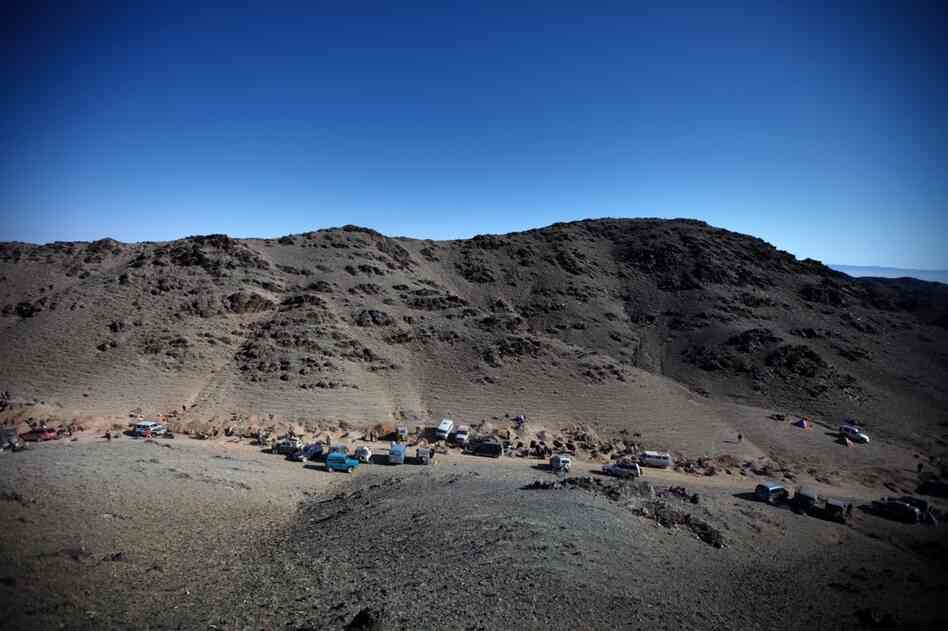 Some Mongolians who can't find work with the mines are striking out on their own, as has this group of gold prospectors who line a valley in the South Gobi hills.