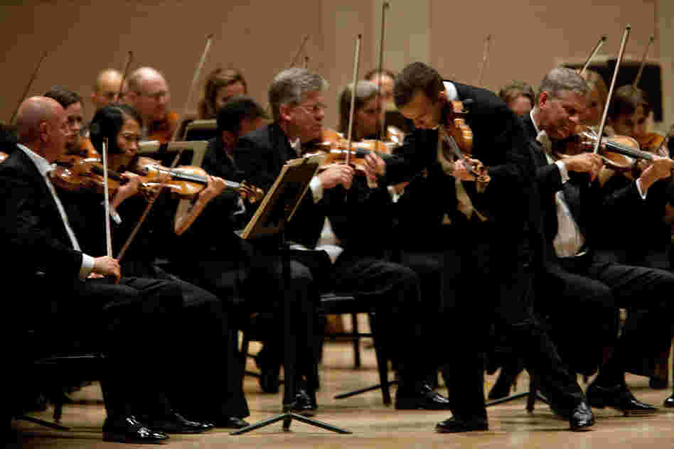 Shaham, a physically intense player, strode about the stage as he played one of his signature pieces. 