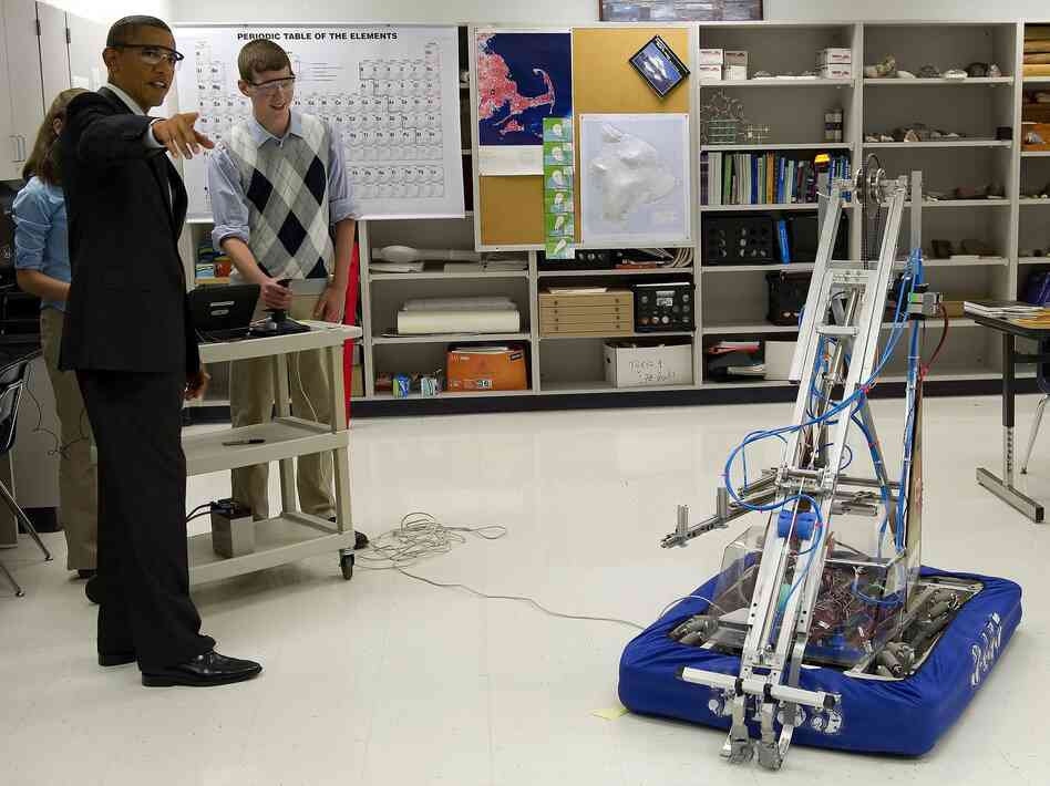 Students show President Obama inventions they entered in a robotics competition at Thomas Jefferson High School for Science and Technology in Alexandria, Va., last September.