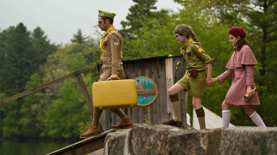 Cousin Ben (Jason Schwartzman) leads Sam (Jared Gilman) and Suzy (Kara Hayward) down a dock in Moonrise Kingdom. The film, set in 1965, follows Sam and Suzy when they elope together into the wilderness of the fictitious New Penzance island. Cousin Ben (Jason Schwartzman) leads Sam (Jared Gilman) and Suzy (Kara Hayward) down a dock in Moonrise Kingdom. The film, set in 1965, follows Sam and Suzy when they elope together into the wilderness of the fictitious New Penzance island.