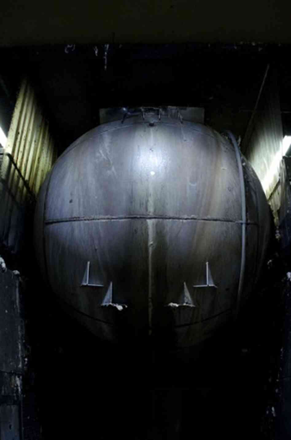 The rotary digester, about 15 feet across, uses steam and chemicals to cook away the contaminants in cotton and linen fibers. 