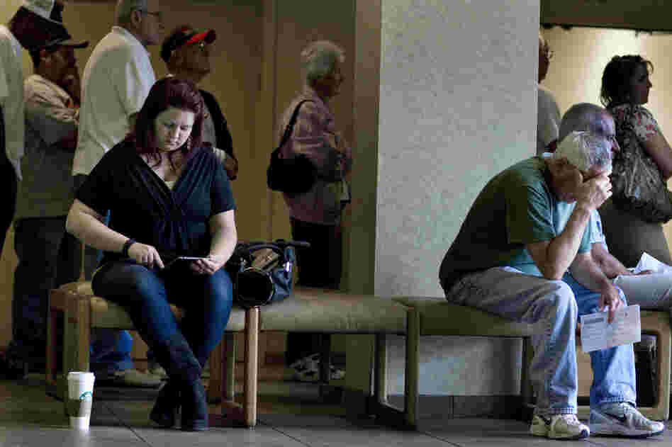 Amber waits for her monthly blood test at a lab in Modesto. For several months she couldn't afford the tests, but then her company changed insurance again and she was able to resume them.