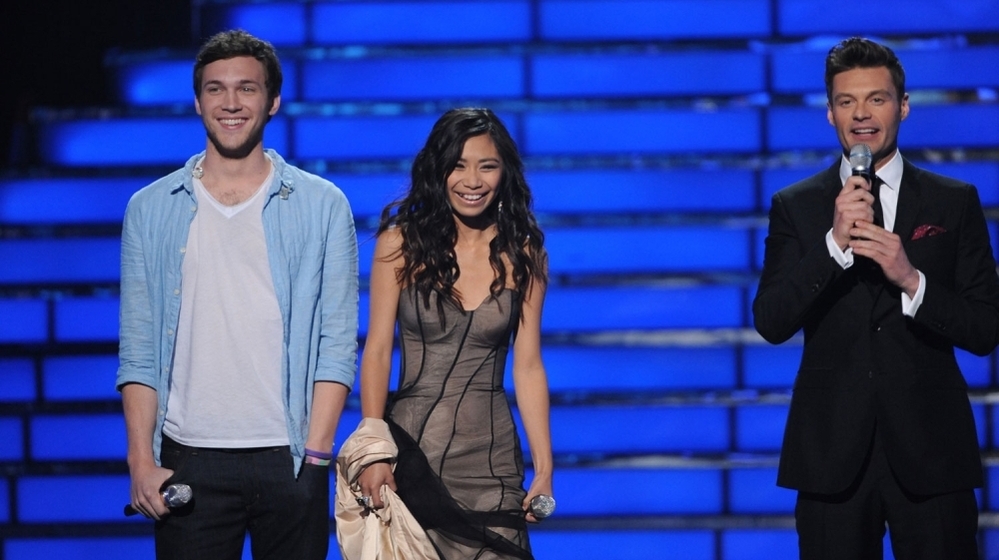 American Idol finalists Phillip Phillips and Jessica Sanchez on stage with host Ryan Seacrest on the Fox TV show Tuesday night.