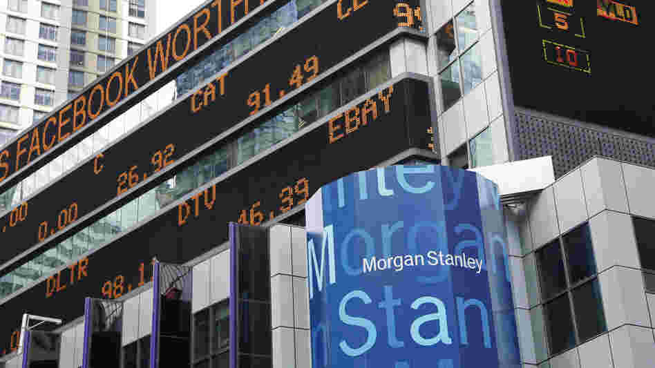 A financial news stock ticker on Morgan Stanley headquarters carries a headline about Facebook on Wednesday. Some investors wonder whether Facebook and Morgan Stanley withheld information before the Facebook stock offering.