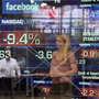 Television correspondent Sabrina Quagliozzi reports from inside the Nasdaq MarketSite in New York's Times Square on Monday.