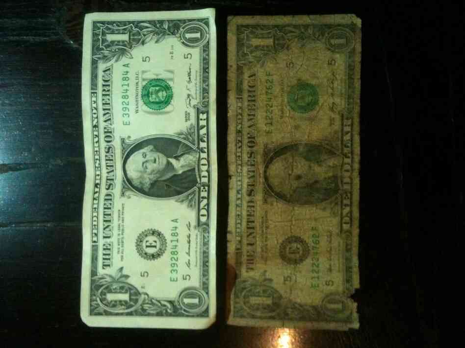 Many of the U.S. dollars used in Zimbabwe have changed hands so often they are falling apart. But there are some new bills in circulation as well.