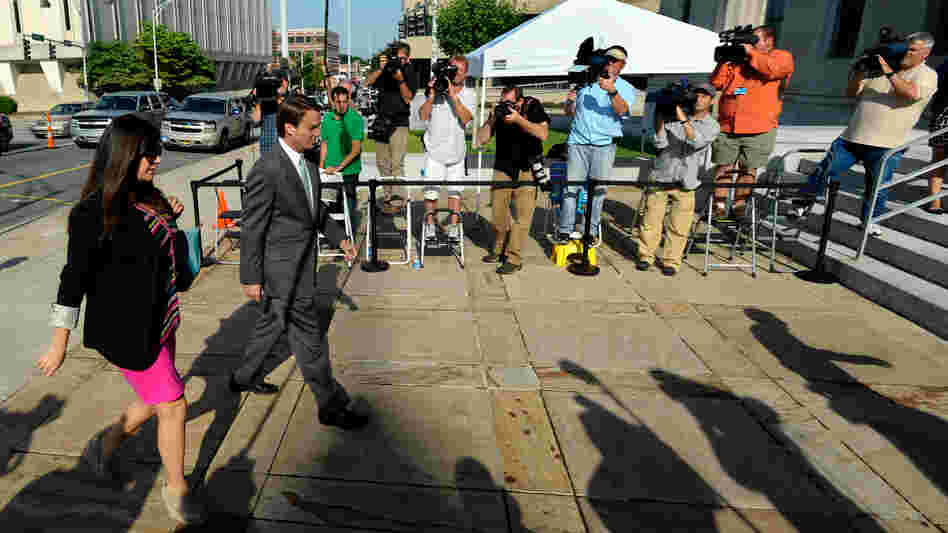 John Edwards arrives with his daughter, Cate Edwards, at U.S. District Court in Greensboro, N.C., on May 17 for closing arguments in his trial. The former Democratic presidential candidate has pleaded not guilty to six counts of campaign finance violations.